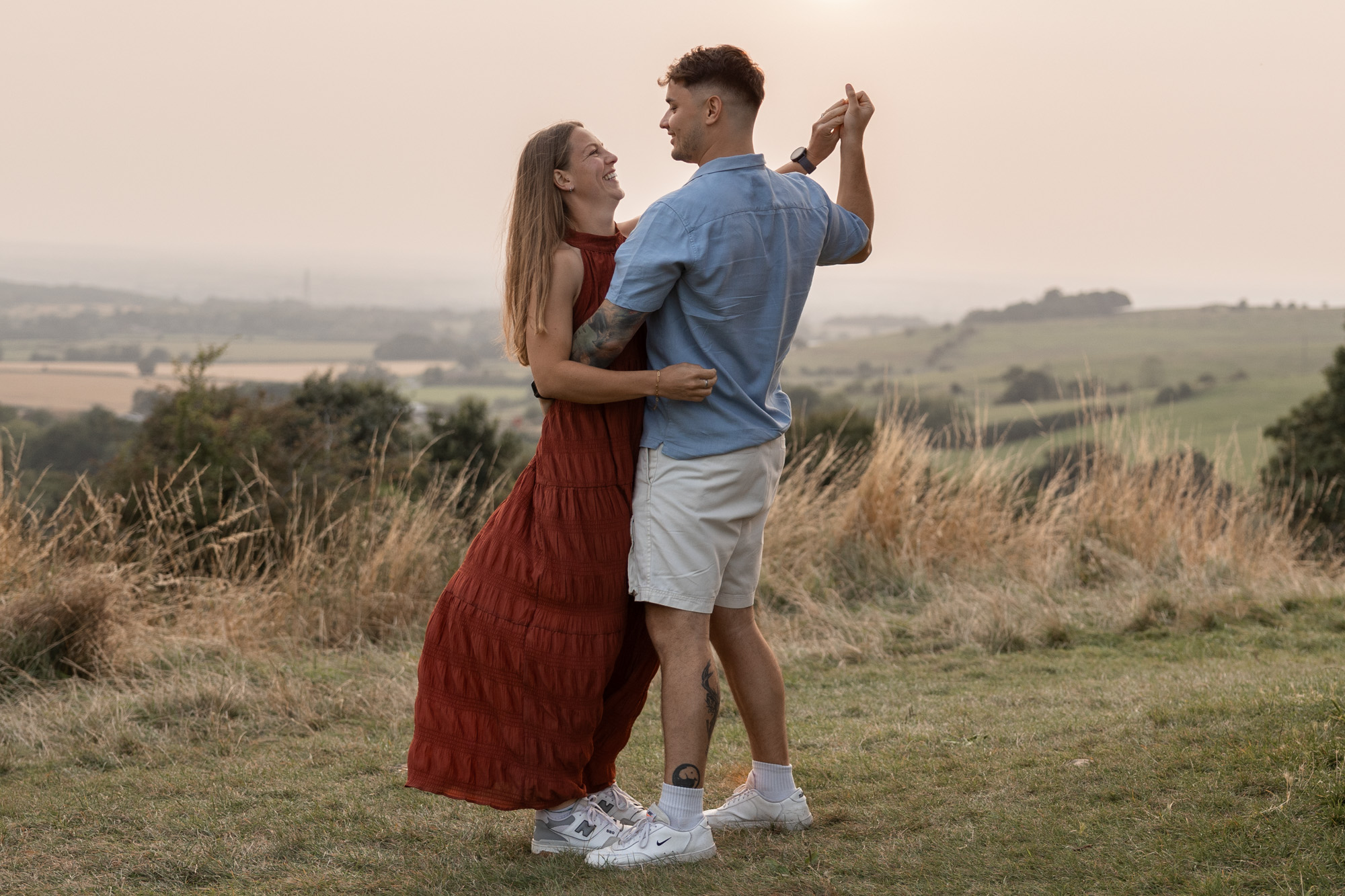 couple dancing golden hour